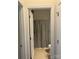Bathroom featuring view into toilet and shower/tub area with shower curtain at 13123 Ashley Meadow Dr, Charlotte, NC 28213