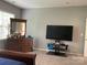 View of bedroom with dresser, TV, and carpet flooring at 13123 Ashley Meadow Dr, Charlotte, NC 28213