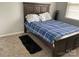 View of bedroom with queen-size bed and carpet flooring at 13123 Ashley Meadow Dr, Charlotte, NC 28213