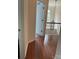 View of hallway with hardwood floors and chandelier lighting at 13123 Ashley Meadow Dr, Charlotte, NC 28213
