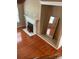 Comfortable living room with hardwood floors, a fireplace, and neutral paint, creating a warm ambiance at 13123 Ashley Meadow Dr, Charlotte, NC 28213
