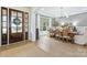Elegant dining room with hardwood floors, a modern chandelier, and sophisticated decor at 1445 Cherry Laurel Dr, Waxhaw, NC 28173