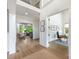 Bright foyer with hardwood floors, opens to a living room, an office and staircase at 1445 Cherry Laurel Dr, Waxhaw, NC 28173