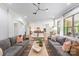 Spacious living room with hardwood floors seamlessly flowing into an open floor plan at 1445 Cherry Laurel Dr, Waxhaw, NC 28173