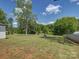 Spacious backyard with large grass yard and shed at 1454 King Rd, York, SC 29745