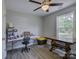 Bedroom with wood floors, ceiling fan, window and desk at 1454 King Rd, York, SC 29745