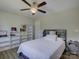 Comfortable bedroom with ample storage space, ceiling fan, and neutral decor at 1454 King Rd, York, SC 29745