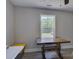 Bedroom featuring wood floors, window and a work table at 1454 King Rd, York, SC 29745