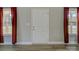 A well lit entryway with modern floors, windows, and a white door at 1454 King Rd, York, SC 29745