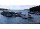 Community boat dock with multiple slips, providing residents with convenient access to the lake at 14621 Waterside Dr, Charlotte, NC 28278