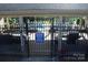 Secured community pool area featuring shaded seating and a refreshing swimming pool for residents enjoyment at 14621 Waterside Dr, Charlotte, NC 28278