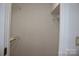 Walk-in closet with wire shelving for organization and plenty of storage space at 14621 Waterside Dr, Charlotte, NC 28278
