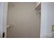 Walk-in closet with wire shelving for organization and plenty of storage space at 14621 Waterside Dr, Charlotte, NC 28278