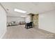 Finished basement with wood burning stove and stone wall at 1512 Mount Ulla Hwy, Mooresville, NC 28115