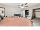 Bedroom with large closet, neutral paint, ceiling fan, and carpet at 1512 Mount Ulla Hwy, Mooresville, NC 28115