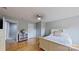 Cozy bedroom with hardwood floors and neutral decor, perfect for relaxation at 15215 Arleta Cir, Charlotte, NC 28277