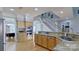 Spacious kitchen featuring wood cabinets, granite countertops, and stainless steel appliances at 15215 Arleta Cir, Charlotte, NC 28277
