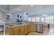 Open concept kitchen featuring granite countertops, stainless steel appliances, and an island at 15215 Arleta Cir, Charlotte, NC 28277