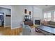Living room featuring a fireplace, hardwood floors, and a comfortable sitting area at 15215 Arleta Cir, Charlotte, NC 28277