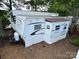 A Flagstaff Classic Super Lite RV with an awning, ready for memorable outdoor experiences and adventures at 164 Dogwood Cir, New London, NC 28127