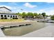 Marina view from boat dock with lake and waterfront homes on a sunny day at 164 Dogwood Cir, New London, NC 28127