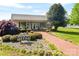 Exterior view of the community office with well-maintained landscaping at 164 Dogwood Cir, New London, NC 28127