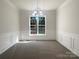 Traditional dining room featuring chair rail and neutral walls at 177 Jacobs Woods Cir, Troutman, NC 28166