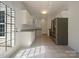 Spacious kitchen with granite countertops, stainless appliances and abundant cabinet storage at 177 Jacobs Woods Cir, Troutman, NC 28166