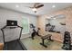 Home gym featuring equipment, mirrors, and natural light at 19143 Juanita Ln, Cornelius, NC 28031