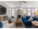 Bright living room with fireplace, hardwood floors and stylish decor at 19143 Juanita Ln, Cornelius, NC 28031
