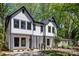 Contemporary exterior showcasing a well-manicured lawn and stylish architectural details at 2006 St John St, Charlotte, NC 28216