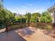 Wide shot of a wooden deck with a railing and landscaped perimeter at 208 Huntley Pl, Charlotte, NC 28207