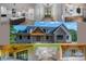 Beautiful home exterior featuring stone accents, wood columns, covered porch, and landscaped yard at 2313 Ivey Church Rd, Maiden, NC 28650