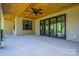 Spacious covered patio with stained wood ceiling and sliding glass doors to the home's interior at 2313 Ivey Church Rd, Maiden, NC 28650