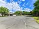 Outdoor basketball court featuring basketball hoops, lines and fencing, for recreational play at 2315 Lawton Bluff Rd, Charlotte, NC 28226