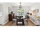 Elegant dining room featuring a round table, chandelier, and natural light, perfect for Gathering gatherings at 2315 Lawton Bluff Rd, Charlotte, NC 28226