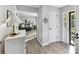 Bright entryway featuring neutral paint colors, wood-look flooring, and access to the living room, creating an airy, connected feel at 2315 Lawton Bluff Rd, Charlotte, NC 28226