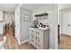 Hallway features a coffee and tea bar with decorative cabinet and mug display at 2315 Lawton Bluff Rd, Charlotte, NC 28226