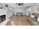 Open living room with fireplace, wood floors, and plenty of space for relaxing and entertaining at 2315 Lawton Bluff Rd, Charlotte, NC 28226