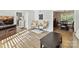 Cozy living room with hardwood floors, a TV, and comfortable seating, ideal for relaxation and entertainment at 2315 Lawton Bluff Rd, Charlotte, NC 28226