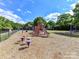 Outdoor playground with swings and slides for  at 2315 Lawton Bluff Rd, Charlotte, NC 28226