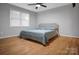 Bright bedroom features hardwood floors, neutral walls and ceiling fan at 2502 Gold Rush Dr, Lincolnton, NC 28092