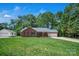 Well-maintained brick home with lush green lawn and attached garage at 2502 Gold Rush Dr, Lincolnton, NC 28092