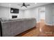 Warm living area featuring hardwood floors, comfortable seating, and fireplace, perfect for relaxing evenings at 2502 Gold Rush Dr, Lincolnton, NC 28092