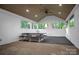 Covered patio with picnic table, ceiling fan and view of backyard at 2502 Gold Rush Dr, Lincolnton, NC 28092