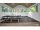 Covered patio with picnic table, ceiling fan and view of backyard at 2502 Gold Rush Dr, Lincolnton, NC 28092