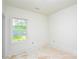 A room with white trim and paint, illuminated by natural light through a window at 2706 Lyla Ave, Concord, NC 28027