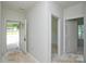 Unfinished entryway with doors leading to other rooms at 2706 Lyla Ave, Concord, NC 28027