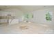Bright, unfinished living area with white walls and natural light at 2706 Lyla Ave, Concord, NC 28027