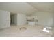 Spacious living area with vaulted ceilings and kitchen at 2706 Lyla Ave, Concord, NC 28027